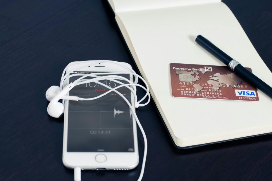 Phone and credit card show Top Credit Card Mistakes Beginners Make